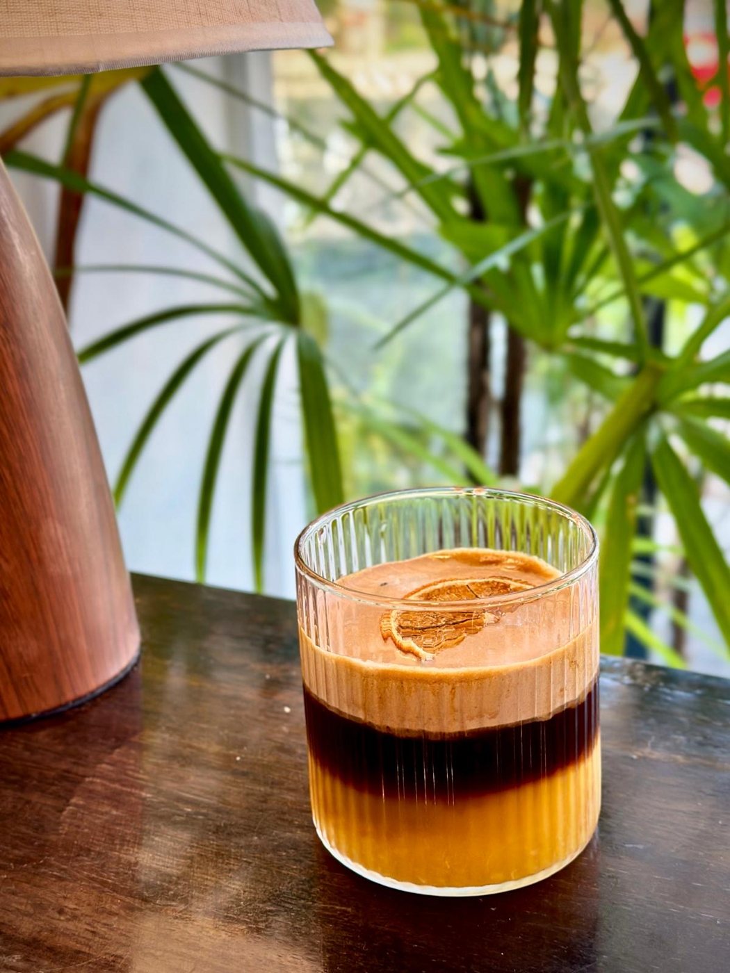 Samui Sunset, a three layered coffee, chocolate ganash, double espresso and orange juice with a dehydrated orange slice, at Izzy's Specialty Coffee, Bo Put, Ko Samui
