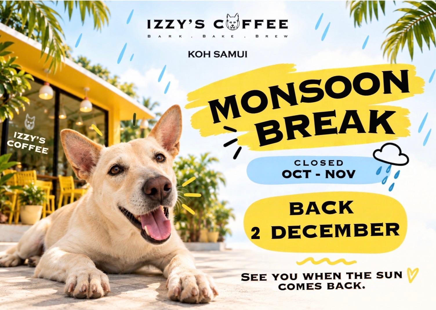 Izzy the rescue dog in front of the yellow Izzy's Coffee café — Monsoon Break: closed October to November, back 2 December